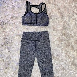 Fashion Nova two piece workout outfit. Zip front sports bra, ankle length pants.